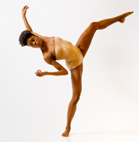 Female ballerina with leg in the air