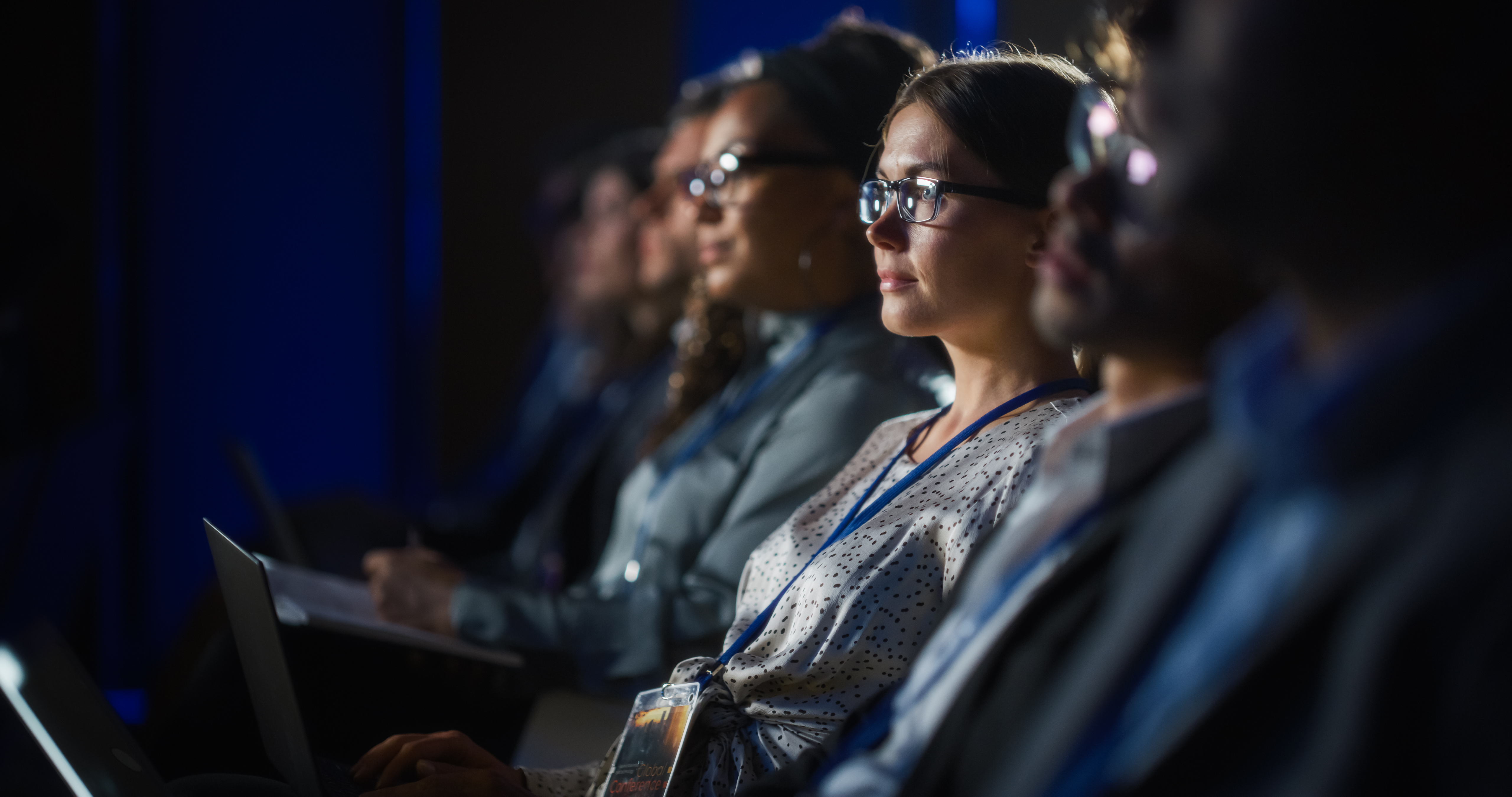 people in a conference lecture